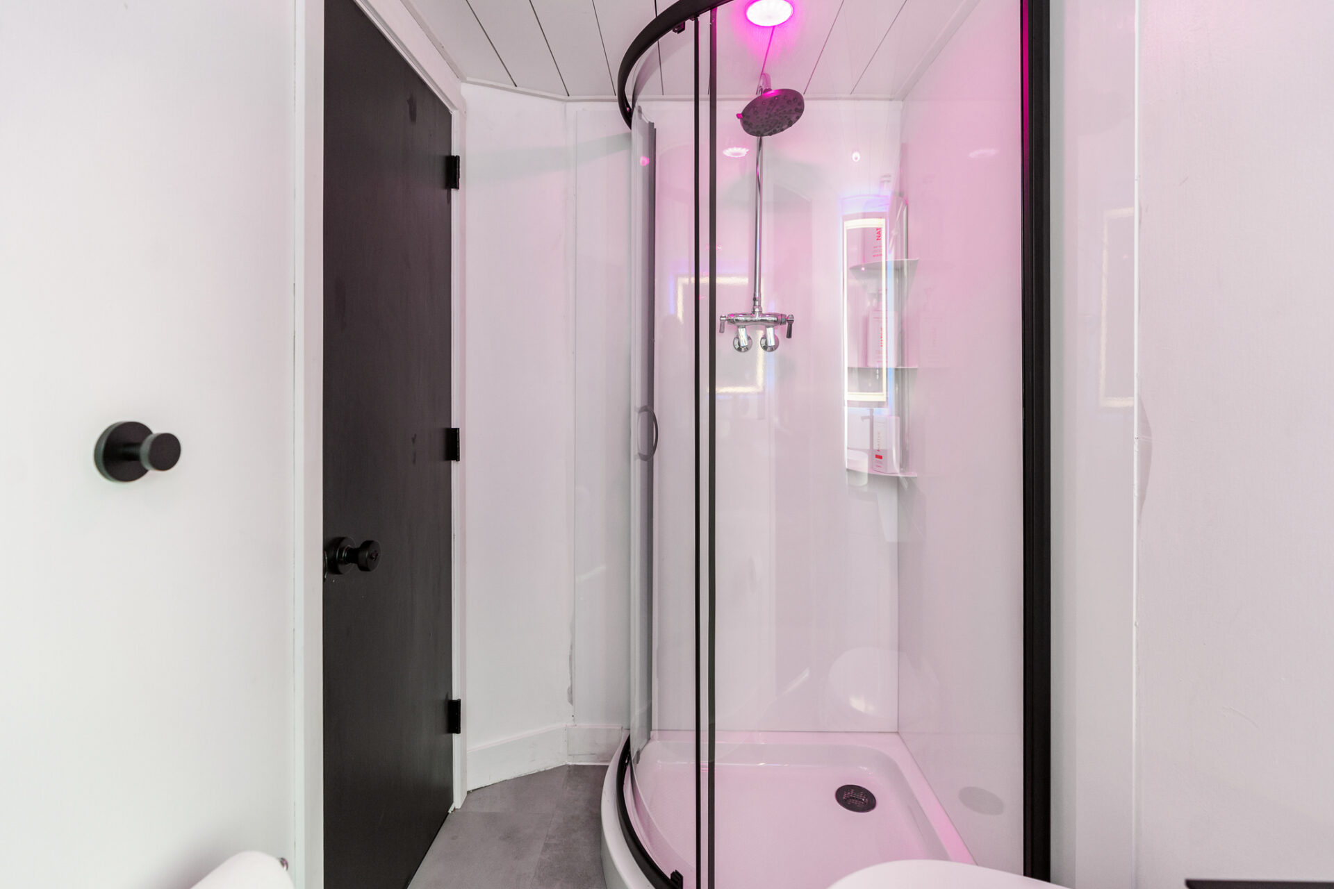 LED shower with pink ambient lighting